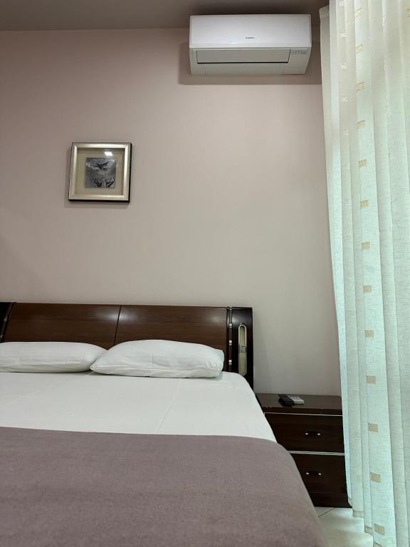 Postel nebo postele na pokoji v ubytování Vila Vadeha
