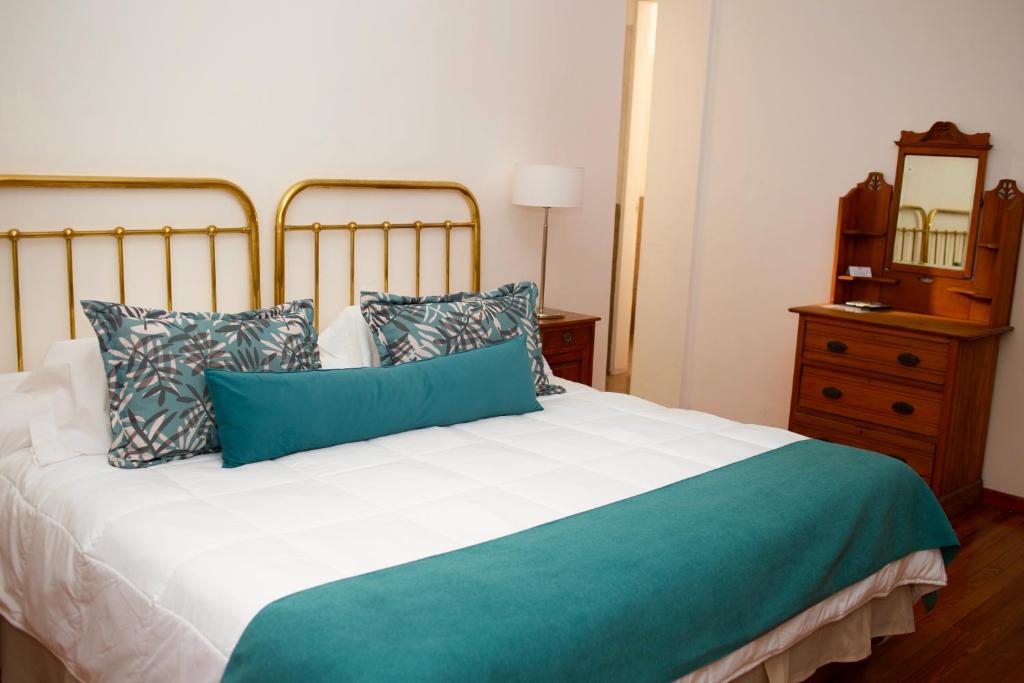 Ένα ή περισσότερα κρεβάτια σε δωμάτιο στο Hotel Termas Rosario de la Frontera