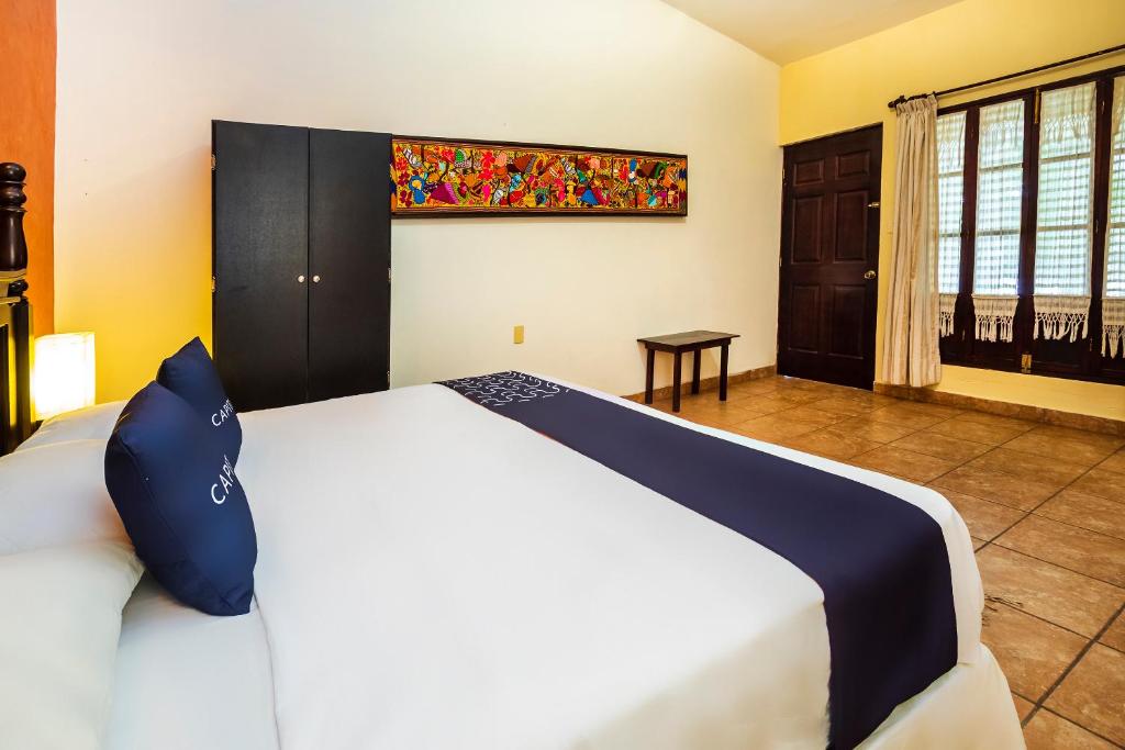 Postel nebo postele na pokoji v ubytování Hotel El Patio