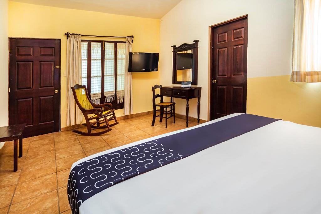 Postel nebo postele na pokoji v ubytování Hotel El Patio
