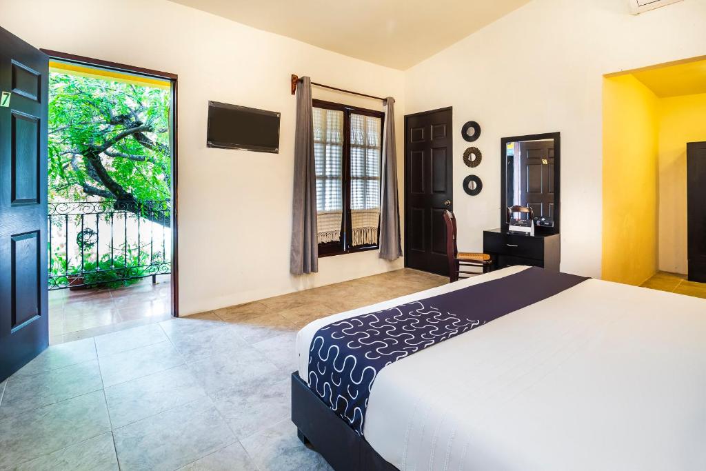 Postel nebo postele na pokoji v ubytování Hotel El Patio