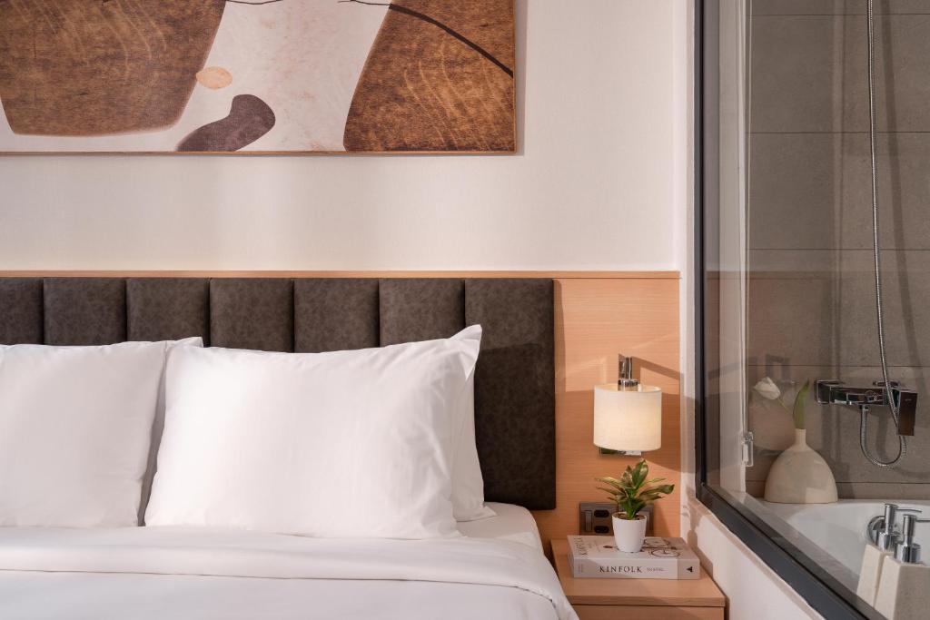Voodi või voodid majutusasutuse Keypad Hotel - Linh Lang toas