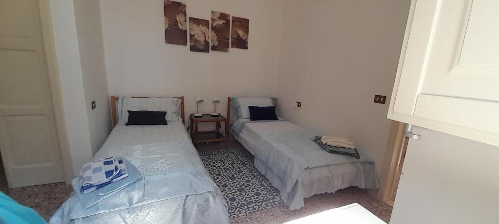 Postel nebo postele na pokoji v ubytování Masseria Ai Pioppi