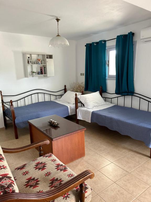 Posteľ alebo postele v izbe v ubytovaní Ada's House