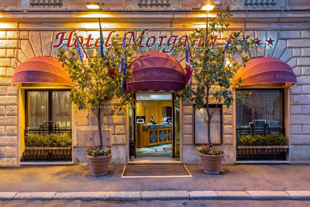 een winkel voor een restaurant met bloeiende planten voor de deur bij Hotel Morgana in Rome