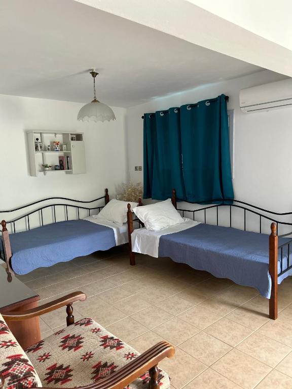 Posteľ alebo postele v izbe v ubytovaní Ada's House