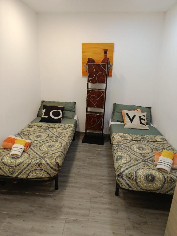 Posteľ alebo postele v izbe v ubytovaní Recantodo'Sol Residence