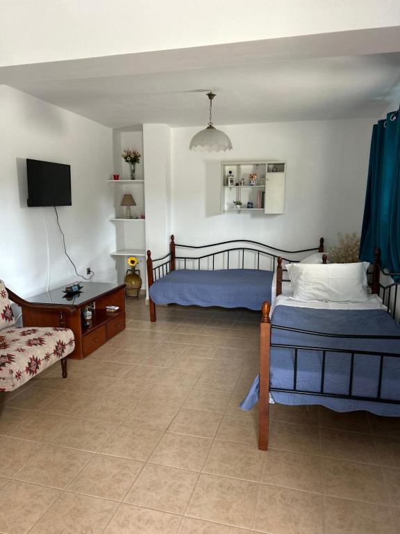 Posteľ alebo postele v izbe v ubytovaní Ada's House
