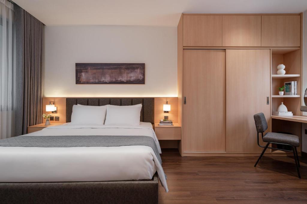 Voodi või voodid majutusasutuse Keypad Hotel - Linh Lang toas