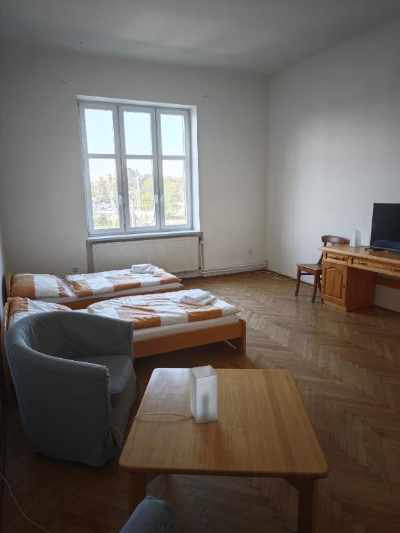 Postel nebo postele na pokoji v ubytování APARTAMENT CIESZYN