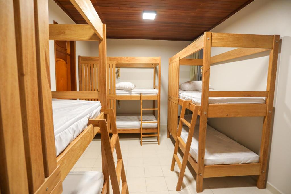 Postel nebo postele na pokoji v ubytování NaCasa Hostel