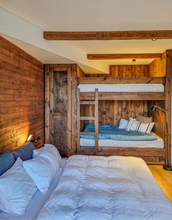 Postel nebo postele na pokoji v ubytování Atrium New Gudauri by Gudauri Travel