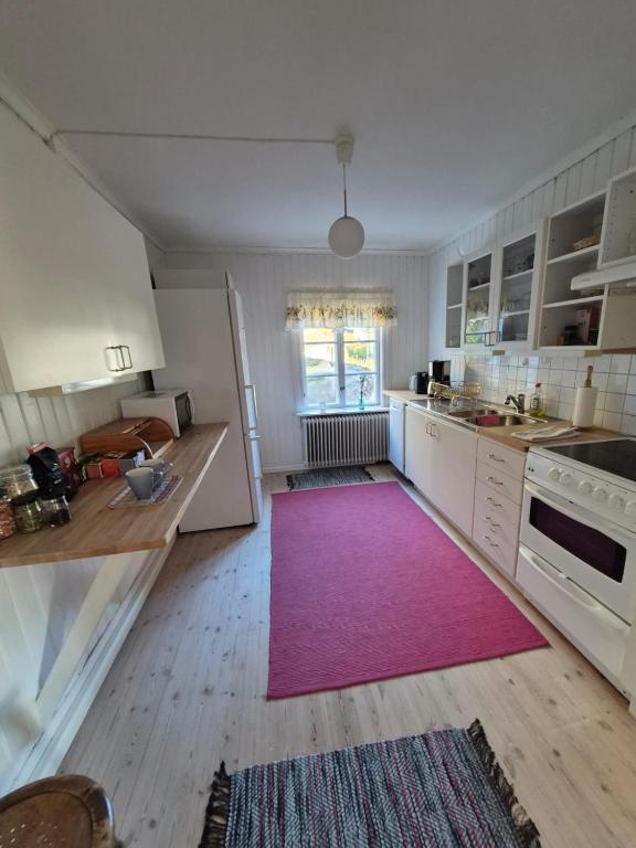 Kuchyň nebo kuchyňský kout v ubytování Lillåns B&B