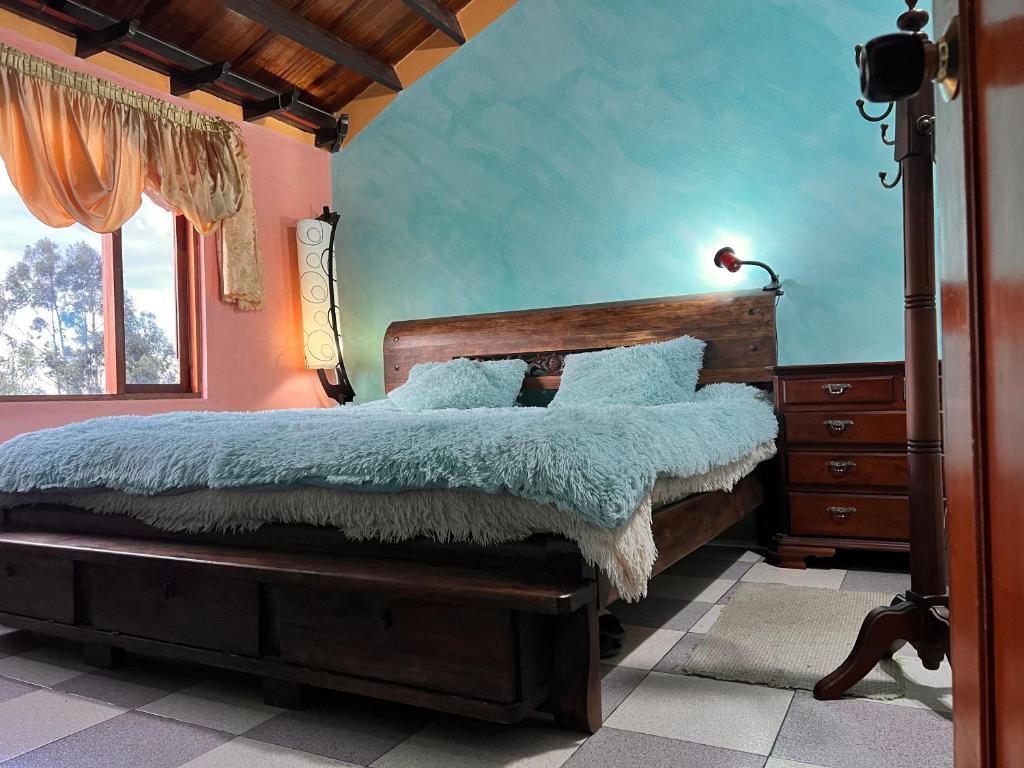 Postel nebo postele na pokoji v ubytování Casa Ortiz