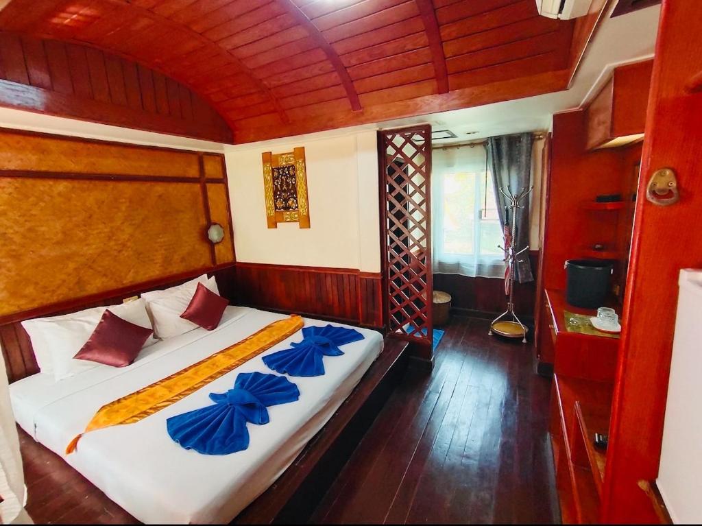 Postel nebo postele na pokoji v ubytování Koh Chang Resort