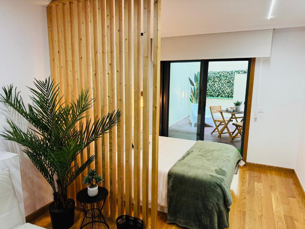 Cama o camas de una habitación en Las Terrazas de Vigo - David