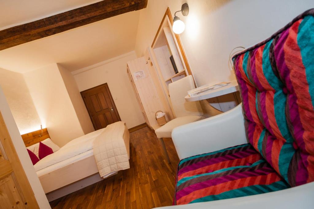 Posteľ alebo postele v izbe v ubytovaní Hotel Fahrnberger