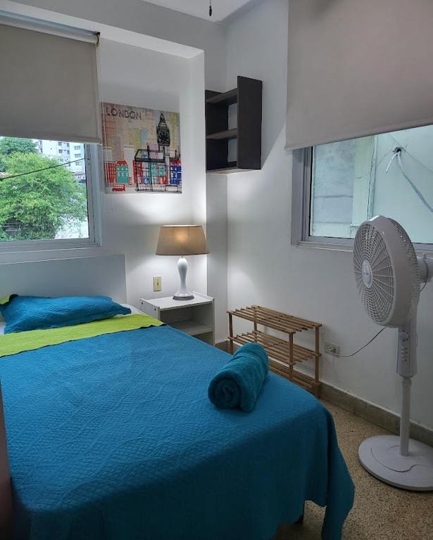Voodi või voodid majutusasutuse Habitaciones R-6 toas