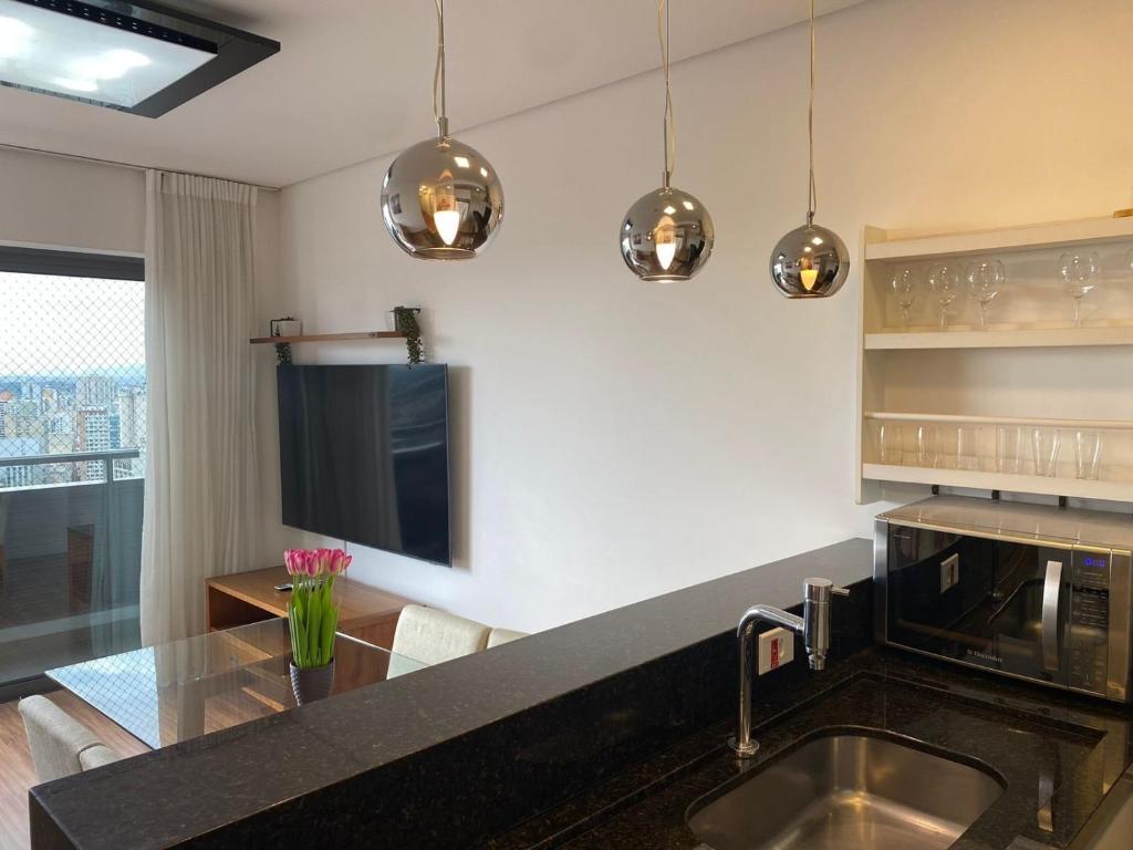 Kuchyň nebo kuchyňský kout v ubytování Viva nas Alturas 2 Quartos com Vaga - UNI2707