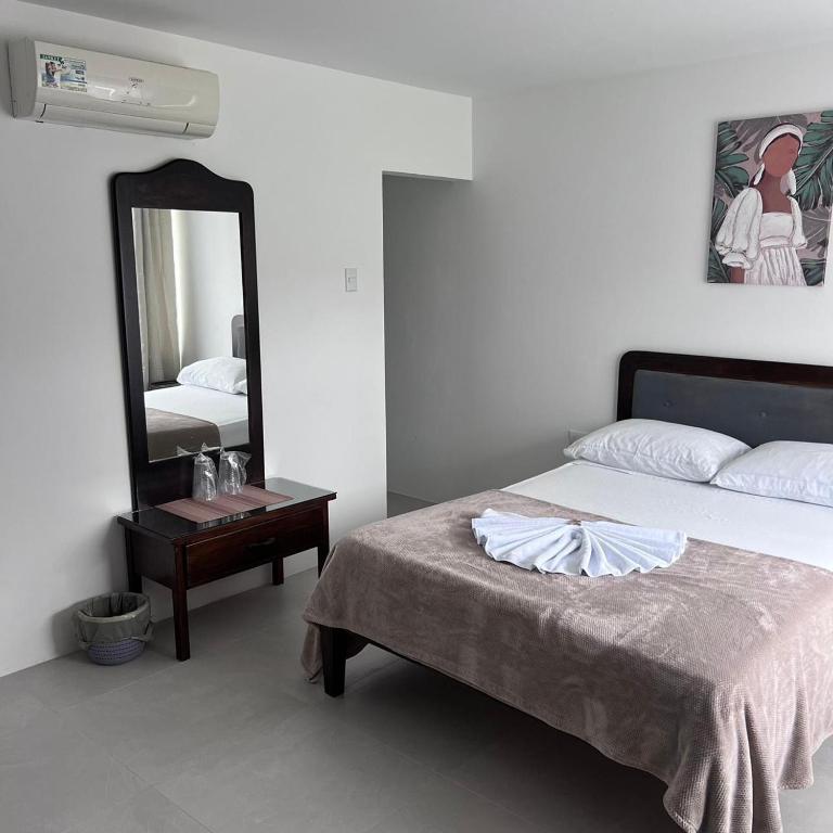 Postel nebo postele na pokoji v ubytování Hotel Naralit