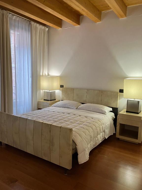 Postel nebo postele na pokoji v ubytování Ciao Amore