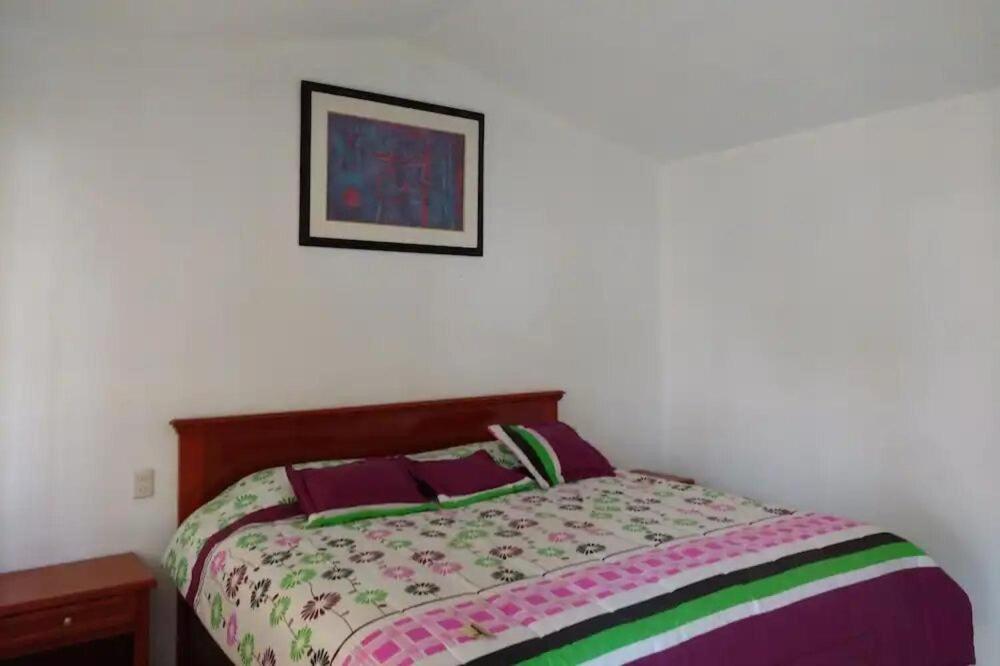 Postel nebo postele na pokoji v ubytování Hotel Mariam
