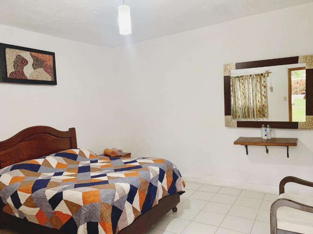 Postel nebo postele na pokoji v ubytování Hotel Mariam