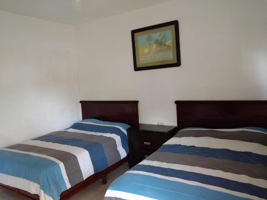 Postel nebo postele na pokoji v ubytování Hotel Mariam
