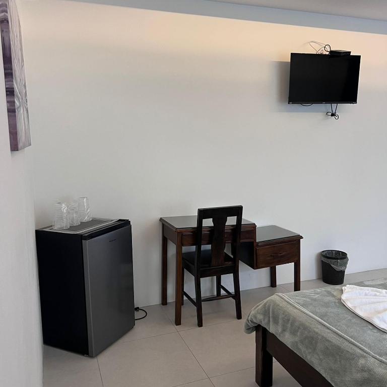 TV a/nebo společenská místnost v ubytování Hotel Naralit