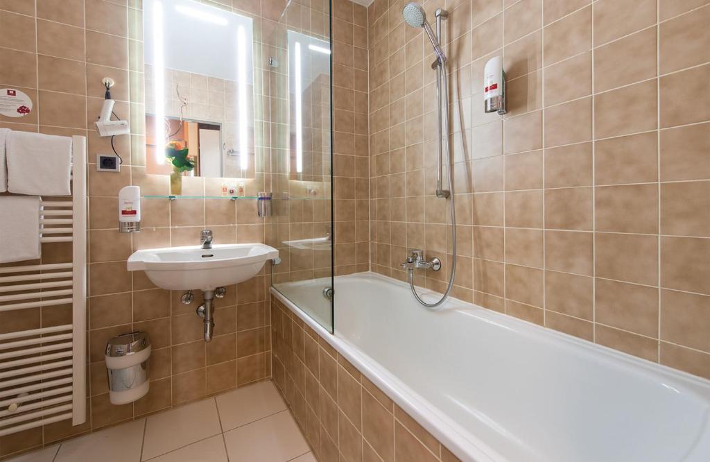 Koupelna v ubytování Leonardo Hotel & Residenz Muenchen