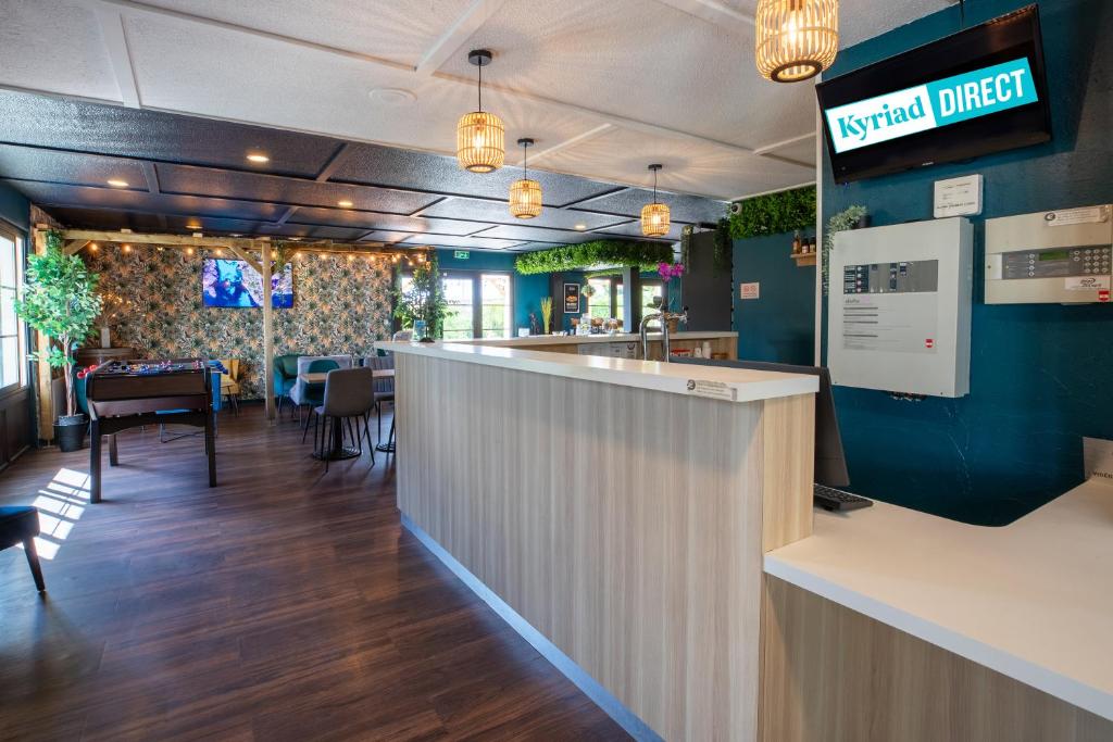 Lounge nebo bar v ubytování Kyriad Direct Laon