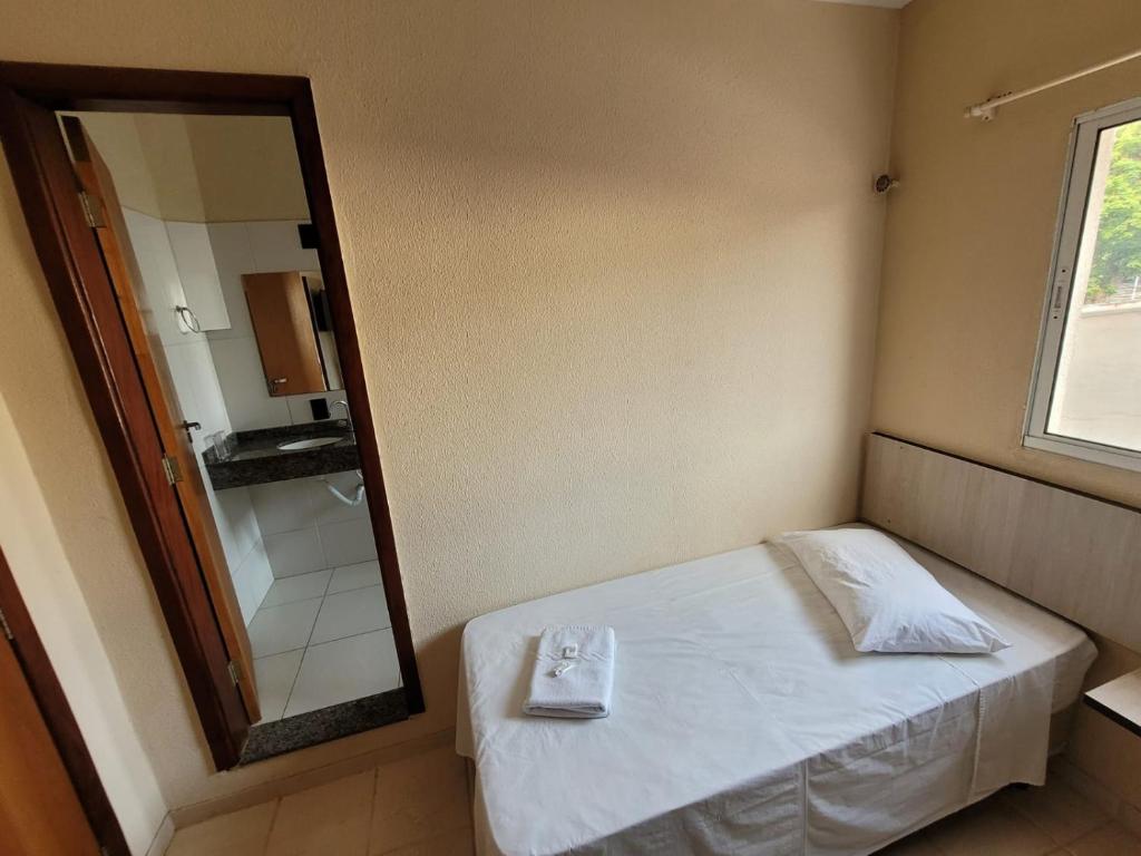 Postel nebo postele na pokoji v ubytování Hotel Globo
