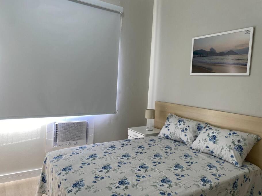 Postel nebo postele na pokoji v ubytování Cantinho da Vic e Cris