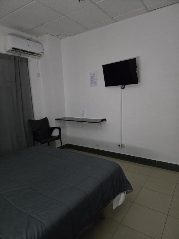 TV a/nebo společenská místnost v ubytování Hotel de castrillo LISBOA