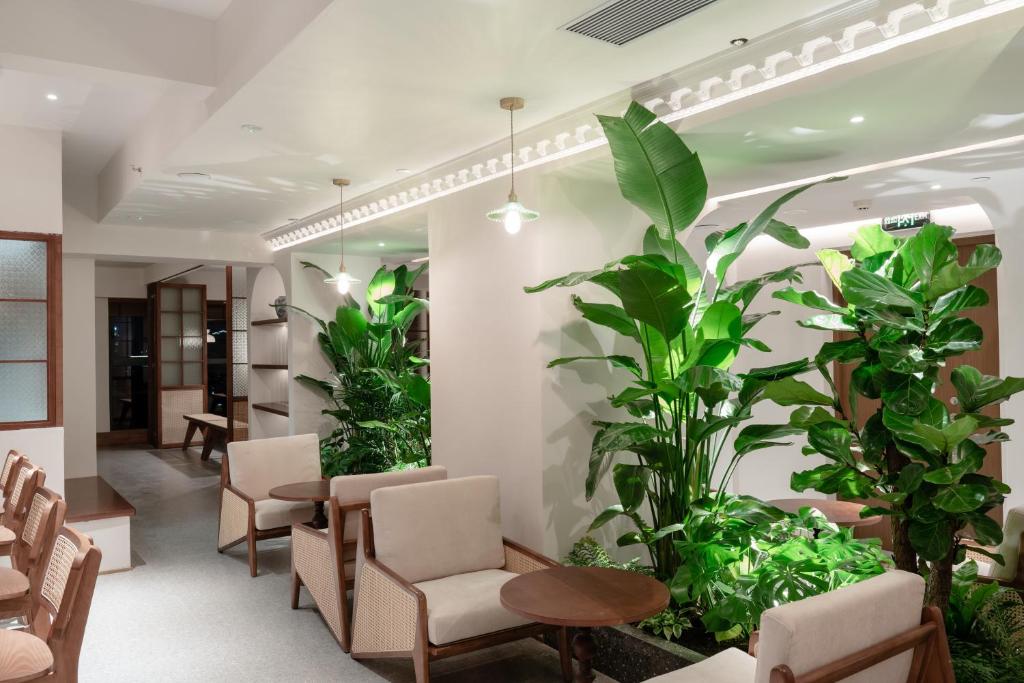 Posezení v ubytování 昆明市呈贡区椿屿岚酒店 Chun Yulan Hotel