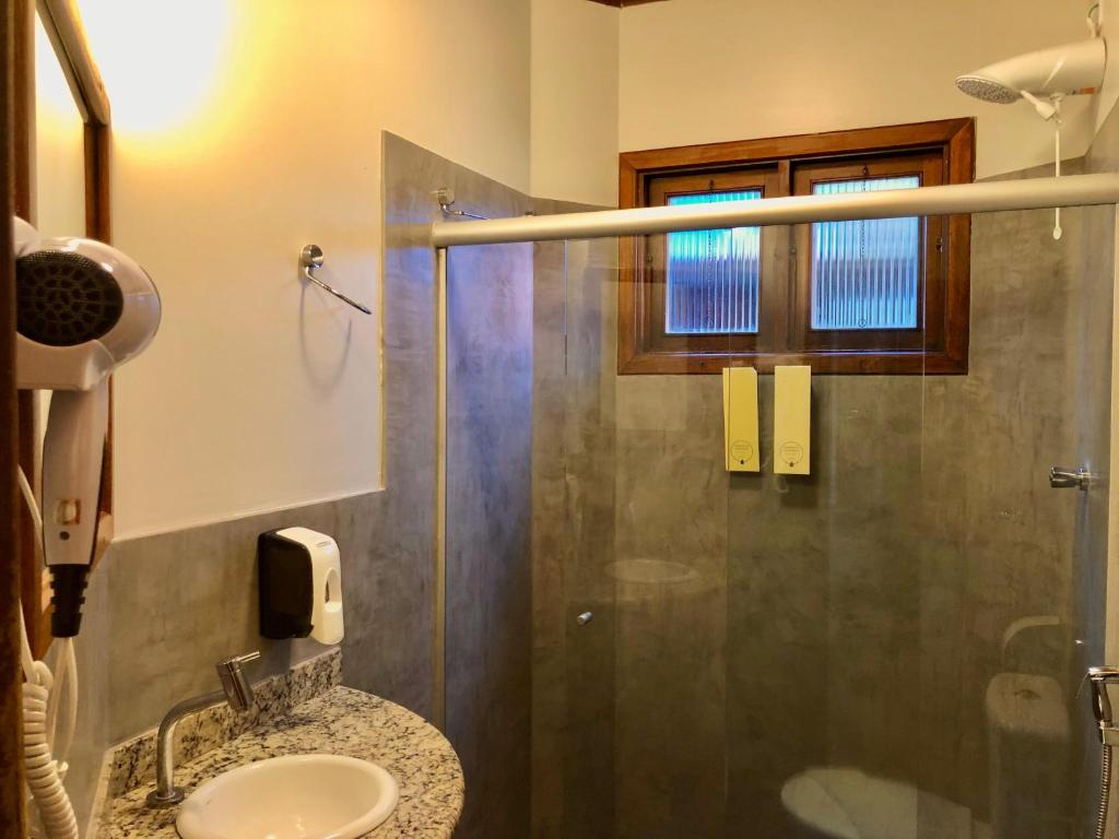 Um banheiro em Ecoporan Hotel Charme Spa & Eventos