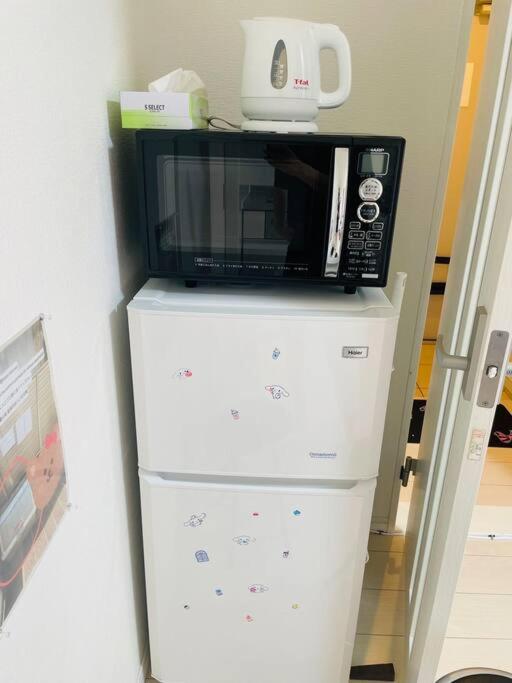 Kitchen o kitchenette sa 糖果屋 岸里玉出