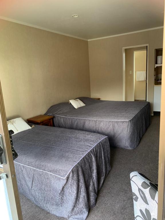 Letto o letti in una camera di Accommodation Gateway Motel