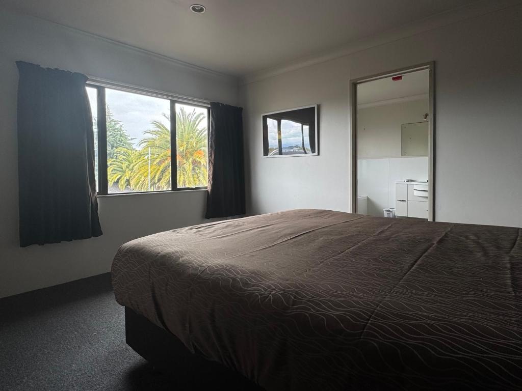 Letto o letti in una camera di Accommodation Gateway Motel
