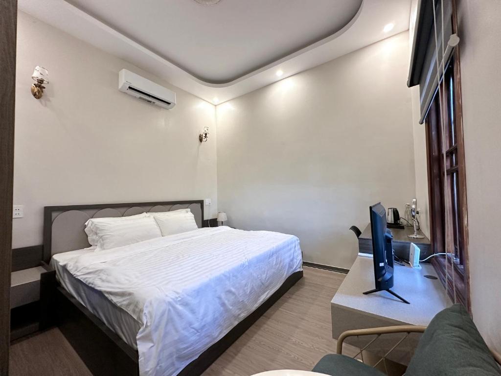Odyssey Hostel, Tours & Motorbikes Rental - Deluxe King Room