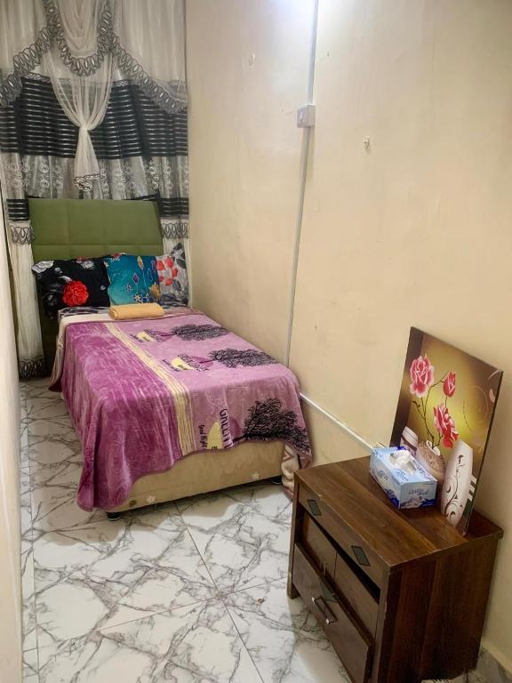 Llit o llits en una habitació de Stable Apartment