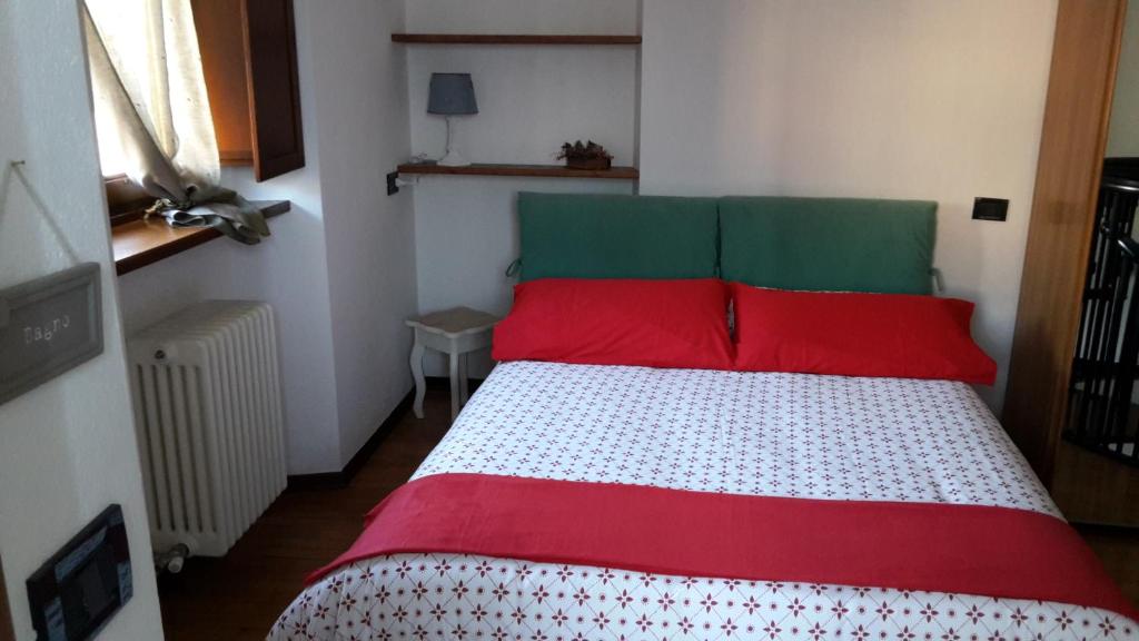 Postel nebo postele na pokoji v ubytování B&B Chanoux