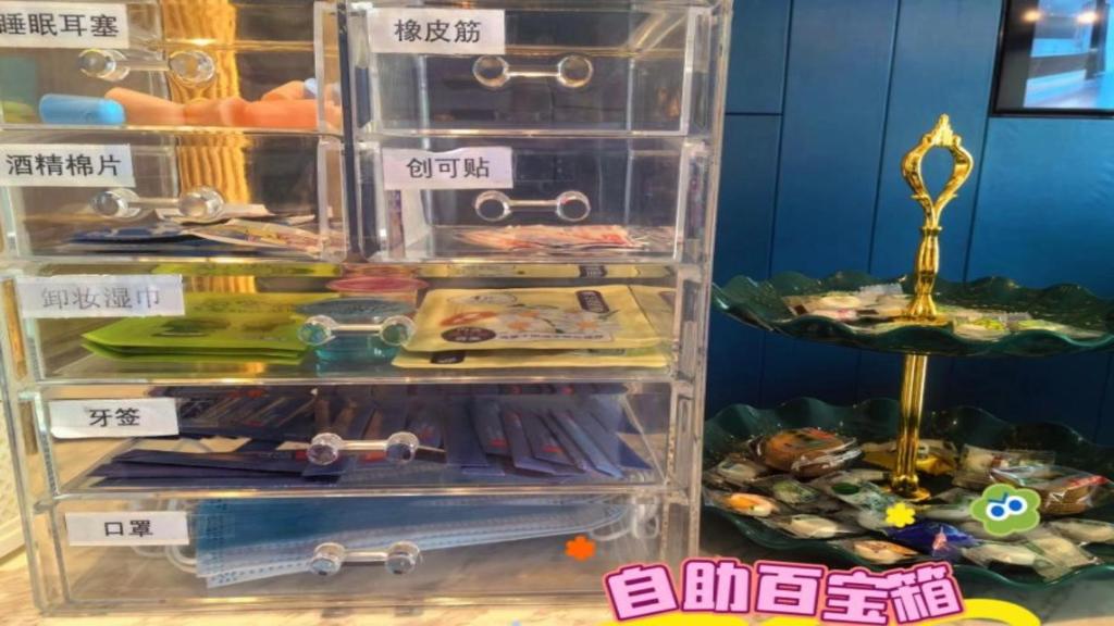 a display case of food in a store at 宜尚酒店 日月广场骑楼老街店 in Haikou