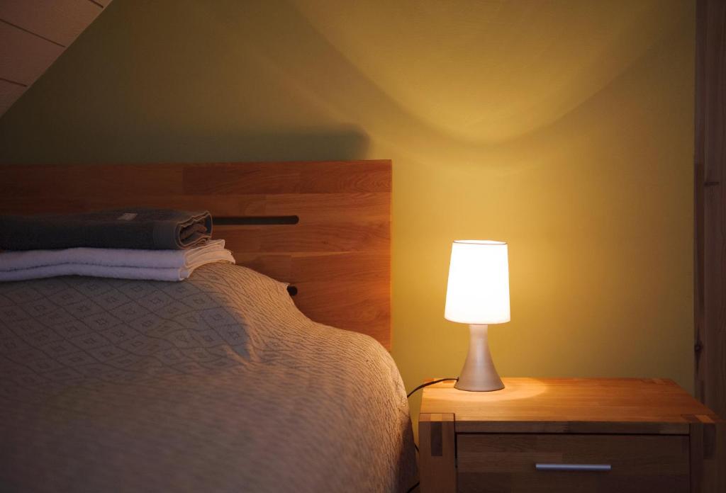 Postel nebo postele na pokoji v ubytování Rootsimaa Holiday House