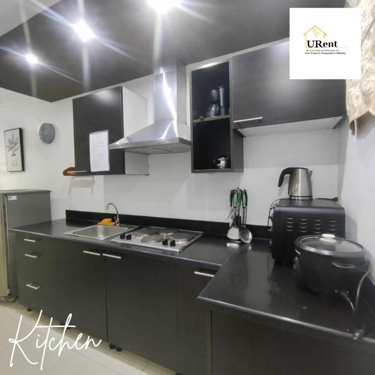Dapur atau dapur kecil di Primavera Residences