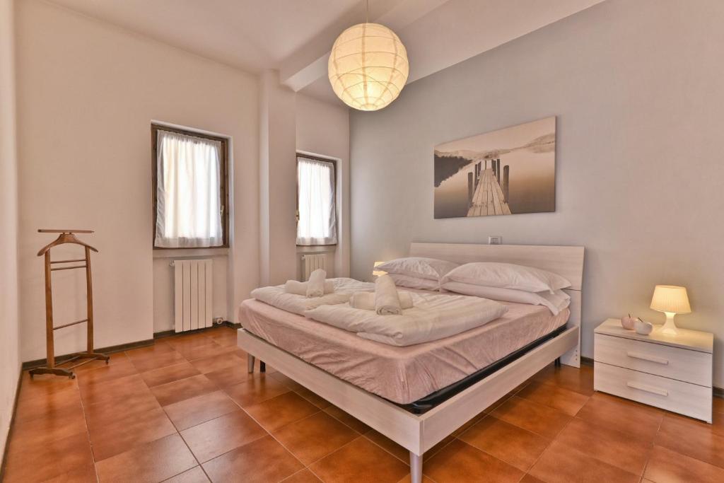 Posteľ alebo postele v izbe v ubytovaní Appartamento Armonia - Theater Home