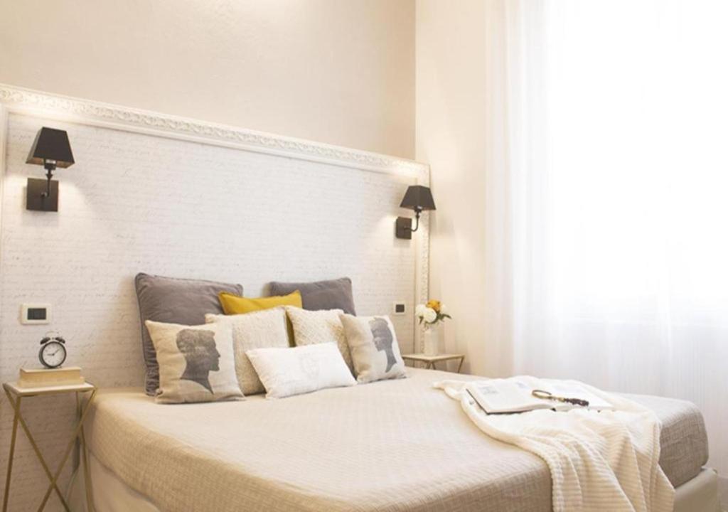 Posteľ alebo postele v izbe v ubytovaní Accanto Al Centro B&B