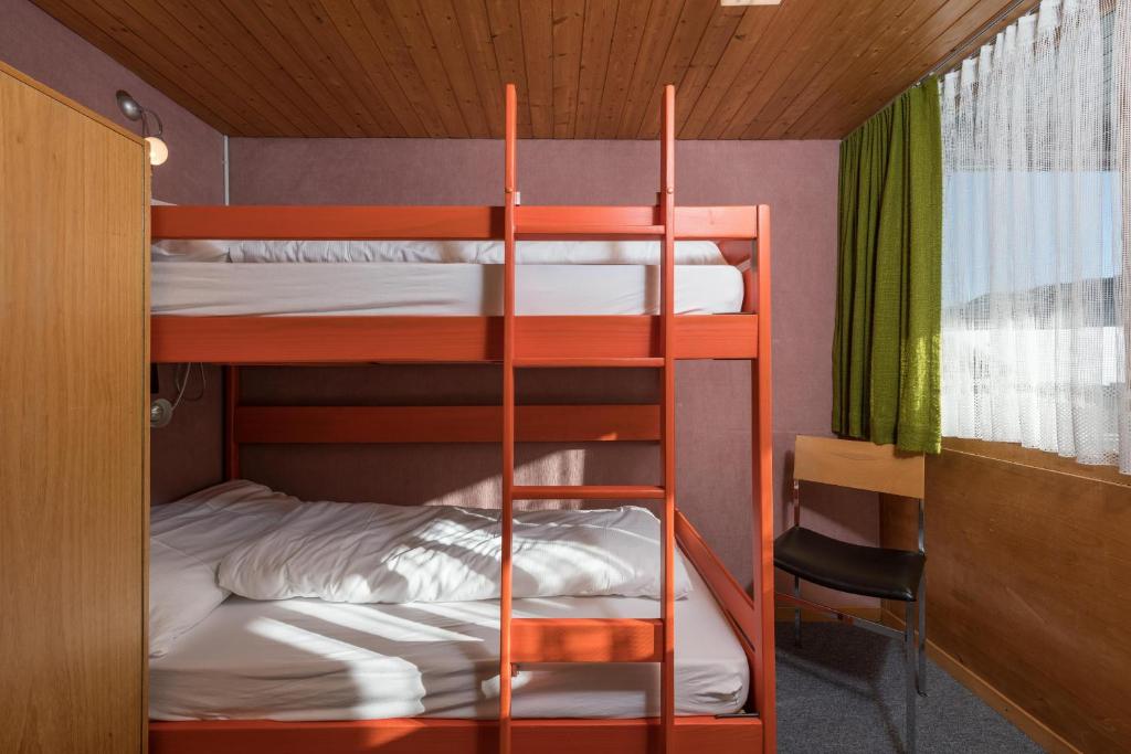 Postel nebo postele na pokoji v ubytování Chalet Pfiff