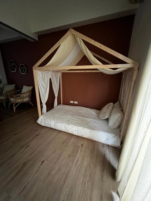 Ein Bett oder Betten in einem Zimmer der Unterkunft Little glass yard B&B