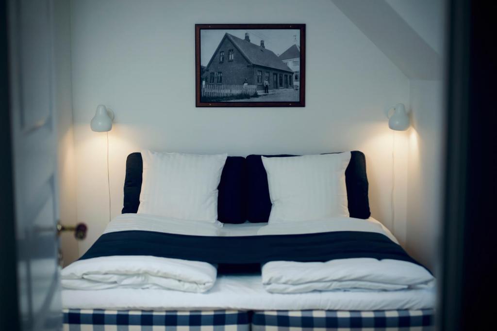 Postel nebo postele na pokoji v ubytování Plesners Badehotel